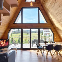 Aslan Chalet stay with A-Frame picture window opening onto the terrace and nature